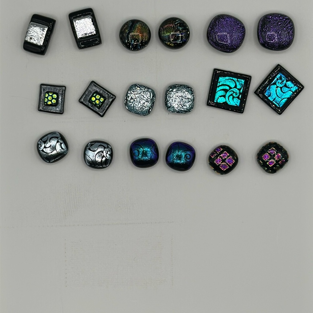 Artisan handmade glass earrings.  Set includes 9 pairs of earrings.